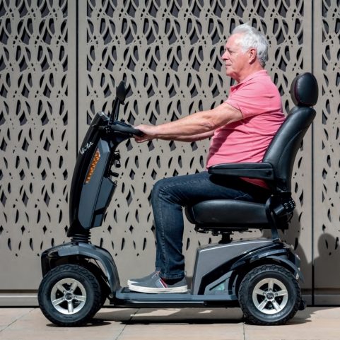 Man on a TGA Vita E Mobility scooter